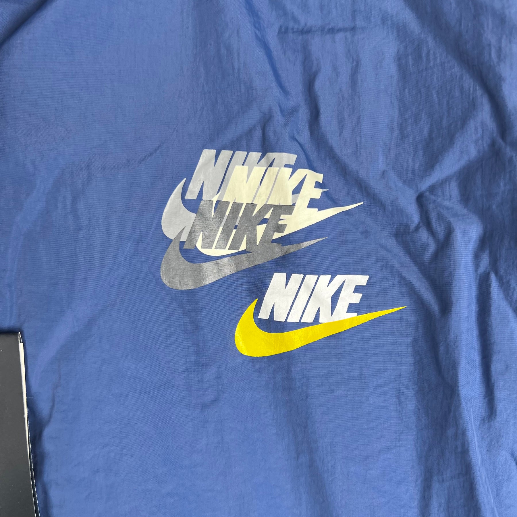 Jaqueta Corta-Vento - Nike 2023 azul com capuz